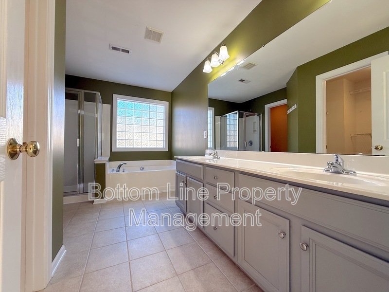 Welcome to Elevated Living in Providence Pointe with this 4BR 3BA Home Available Now! property image