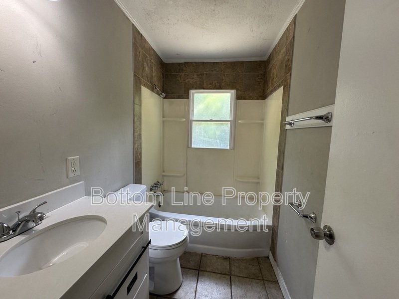 Charming 3BR Home with Sunroom & Detached Garage in Convenient Fayetteville Location property image
