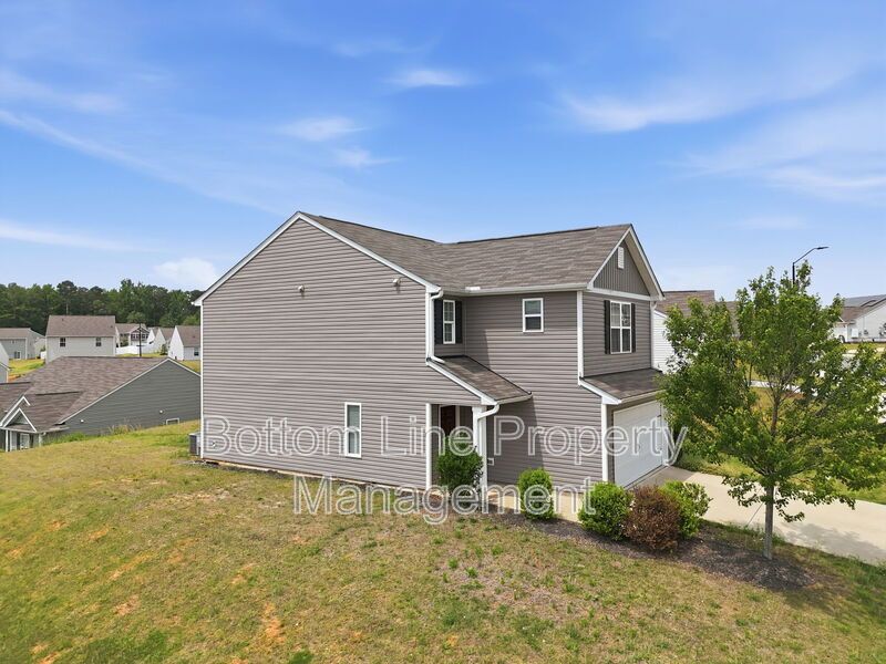 295 Windbreak Lane, Youngsville, NC 27596  $[Insert Listing Price] | 3 Bedrooms | 3 Bathrooms | 1,858 Sq Ft property image