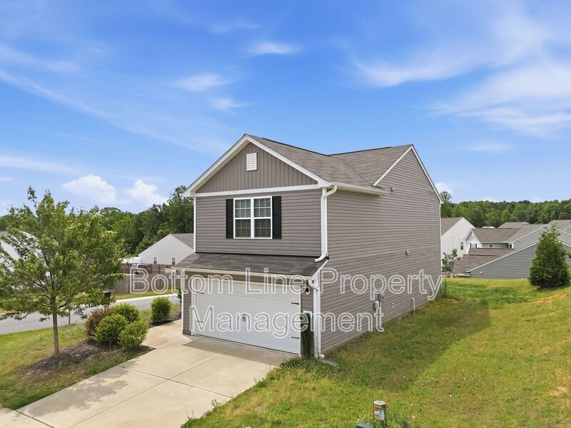 295 Windbreak Lane, Youngsville, NC 27596  $[Insert Listing Price] | 3 Bedrooms | 3 Bathrooms | 1,858 Sq Ft property image