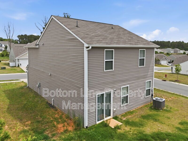 295 Windbreak Lane, Youngsville, NC 27596  $[Insert Listing Price] | 3 Bedrooms | 3 Bathrooms | 1,858 Sq Ft property image