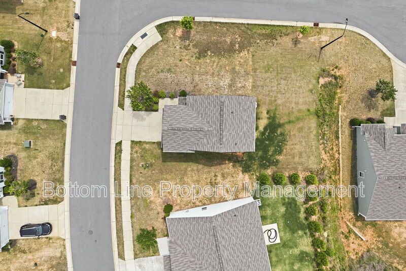 295 Windbreak Lane, Youngsville, NC 27596  $[Insert Listing Price] | 3 Bedrooms | 3 Bathrooms | 1,858 Sq Ft property image