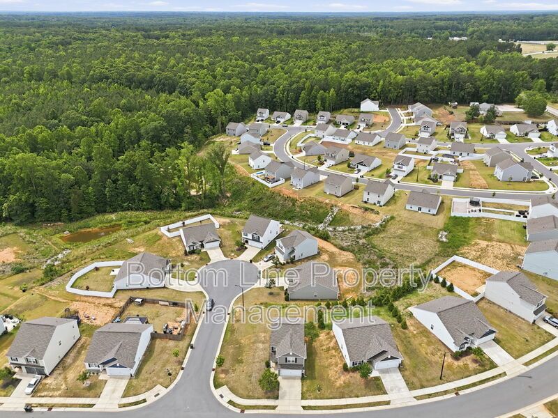 295 Windbreak Lane, Youngsville, NC 27596  $[Insert Listing Price] | 3 Bedrooms | 3 Bathrooms | 1,858 Sq Ft property image