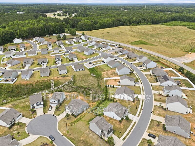 295 Windbreak Lane, Youngsville, NC 27596  $[Insert Listing Price] | 3 Bedrooms | 3 Bathrooms | 1,858 Sq Ft property image