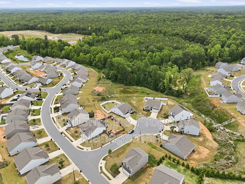 295 Windbreak Lane, Youngsville, NC 27596  $[Insert Listing Price] | 3 Bedrooms | 3 Bathrooms | 1,858 Sq Ft property image