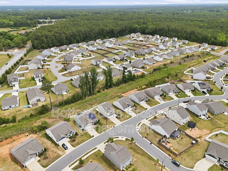 295 Windbreak Lane, Youngsville, NC 27596  $[Insert Listing Price] | 3 Bedrooms | 3 Bathrooms | 1,858 Sq Ft property image