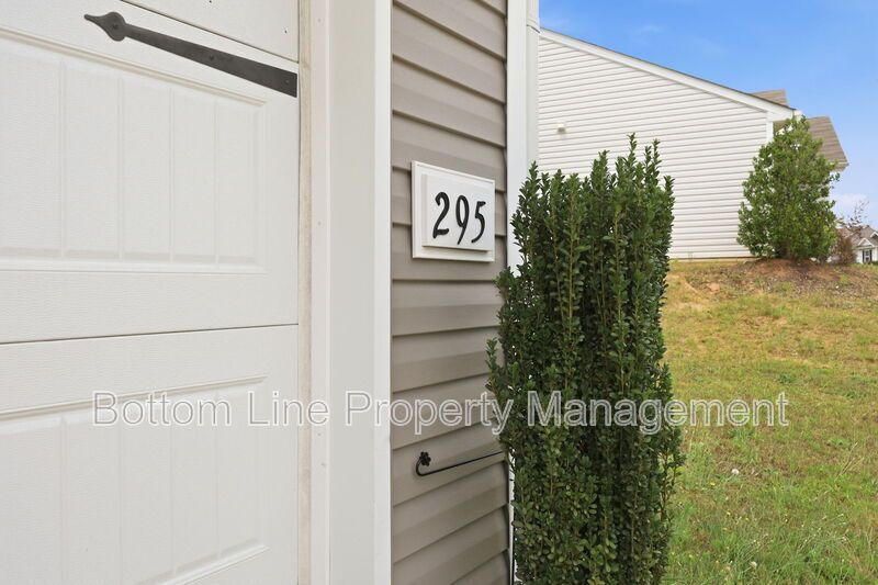 295 Windbreak Lane, Youngsville, NC 27596  $[Insert Listing Price] | 3 Bedrooms | 3 Bathrooms | 1,858 Sq Ft property image