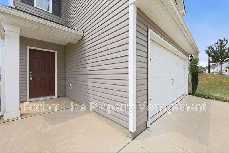 295 Windbreak Lane, Youngsville, NC 27596  $[Insert Listing Price] | 3 Bedrooms | 3 Bathrooms | 1,858 Sq Ft property image