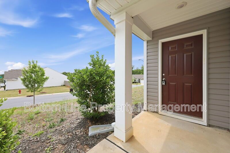 295 Windbreak Lane, Youngsville, NC 27596  $[Insert Listing Price] | 3 Bedrooms | 3 Bathrooms | 1,858 Sq Ft property image