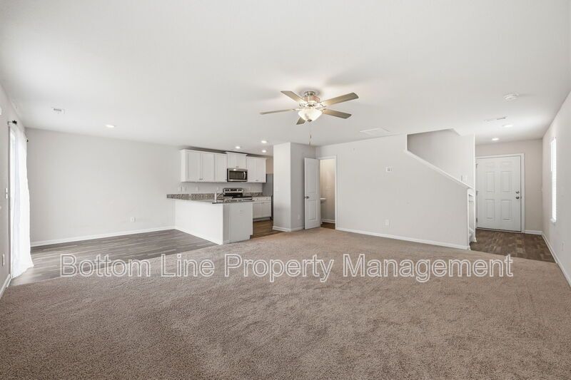 295 Windbreak Lane, Youngsville, NC 27596  $[Insert Listing Price] | 3 Bedrooms | 3 Bathrooms | 1,858 Sq Ft property image