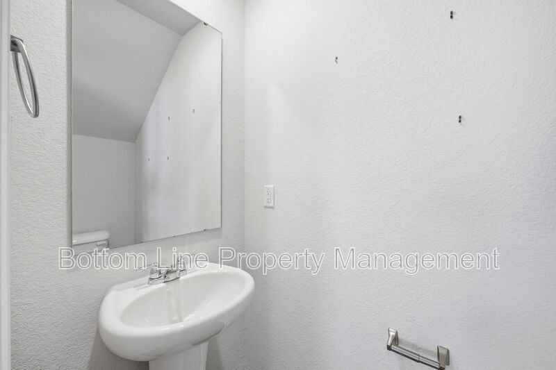 295 Windbreak Lane, Youngsville, NC 27596  $[Insert Listing Price] | 3 Bedrooms | 3 Bathrooms | 1,858 Sq Ft property image