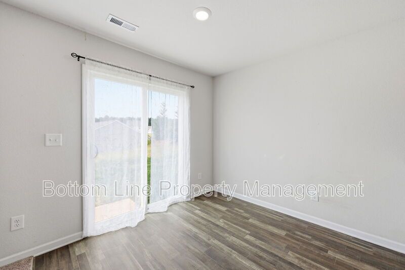 295 Windbreak Lane, Youngsville, NC 27596  $[Insert Listing Price] | 3 Bedrooms | 3 Bathrooms | 1,858 Sq Ft property image