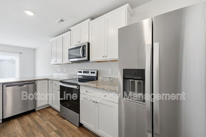 295 Windbreak Lane, Youngsville, NC 27596  $[Insert Listing Price] | 3 Bedrooms | 3 Bathrooms | 1,858 Sq Ft property image