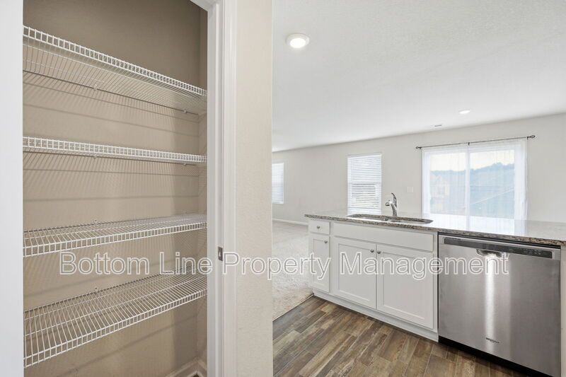 295 Windbreak Lane, Youngsville, NC 27596  $[Insert Listing Price] | 3 Bedrooms | 3 Bathrooms | 1,858 Sq Ft property image