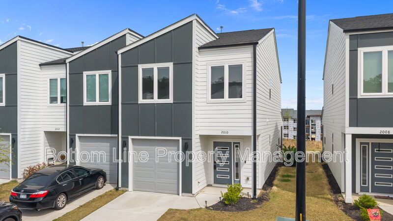 ✨ End-Unit Townhome with Designer Finishes, Screened Porch & Garage in Prime Durham Location property image
