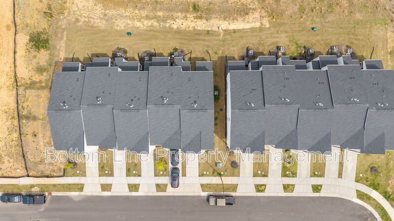 ✨ End-Unit Townhome with Designer Finishes, Screened Porch & Garage in Prime Durham Location property image