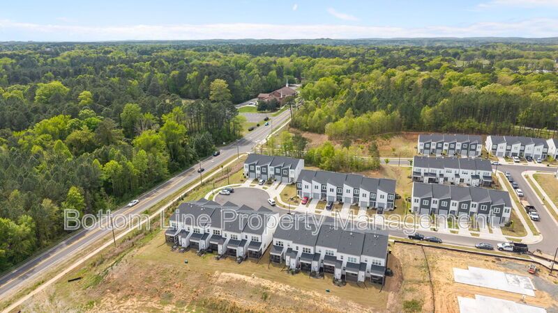 ✨ End-Unit Townhome with Designer Finishes, Screened Porch & Garage in Prime Durham Location property image