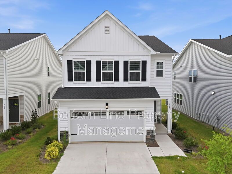 ✨ End-Unit Townhome with Designer Finishes, Screened Porch & Garage in Prime Durham Location property image