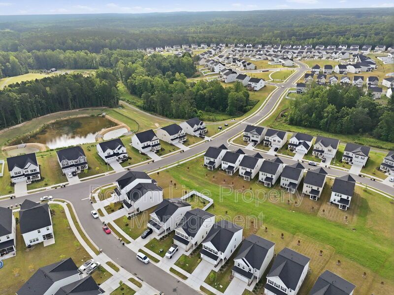 ✨ End-Unit Townhome with Designer Finishes, Screened Porch & Garage in Prime Durham Location property image