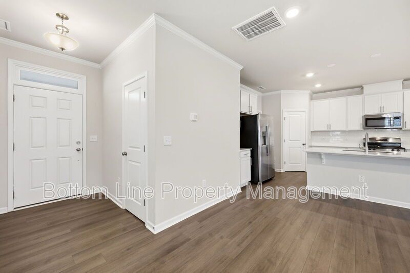 ✨ End-Unit Townhome with Designer Finishes, Screened Porch & Garage in Prime Durham Location property image