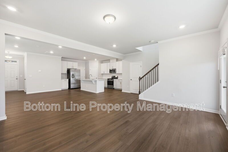 ✨ End-Unit Townhome with Designer Finishes, Screened Porch & Garage in Prime Durham Location property image