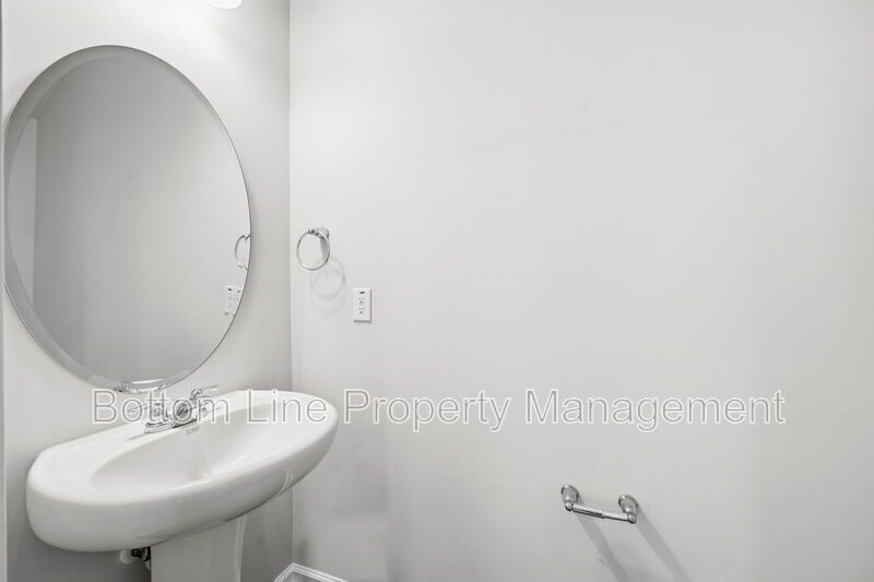 ✨ End-Unit Townhome with Designer Finishes, Screened Porch & Garage in Prime Durham Location property image