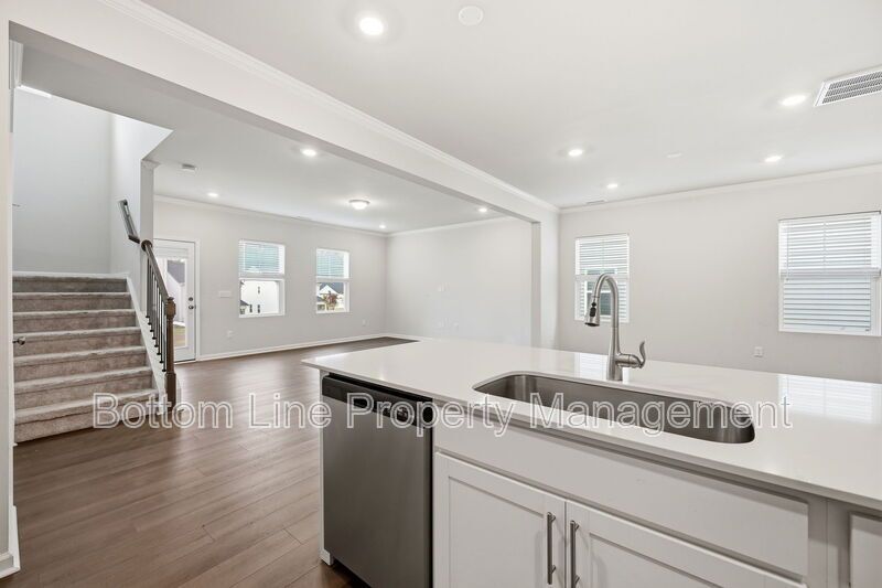 ✨ End-Unit Townhome with Designer Finishes, Screened Porch & Garage in Prime Durham Location property image