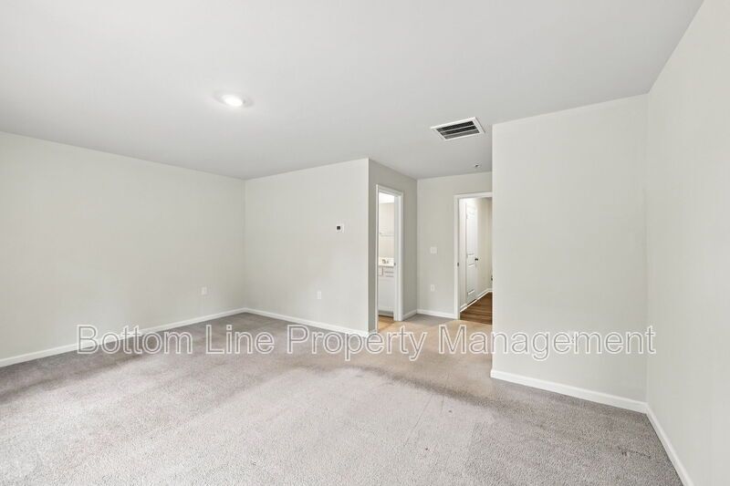 Modern 3BR Townhome in Pool Community | 1-Car Garage | Quartz Counters | Luxury Primary Suite property image