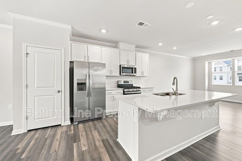 Modern 3BR Townhome in Pool Community | 1-Car Garage | Quartz Counters | Luxury Primary Suite property image