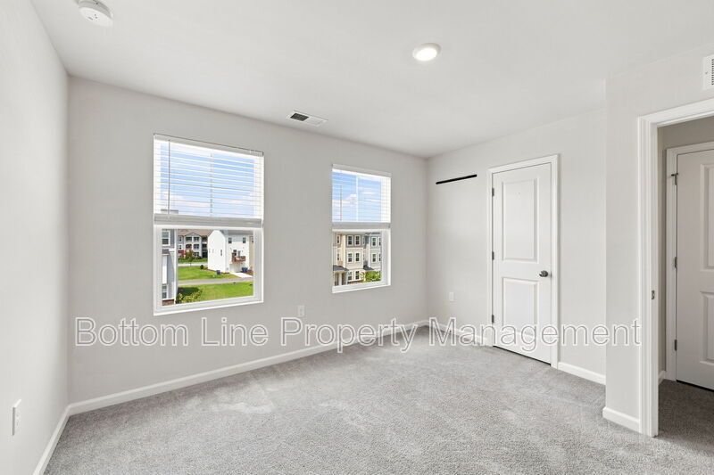 Modern 3BR Townhome in Pool Community | 1-Car Garage | Quartz Counters | Luxury Primary Suite property image