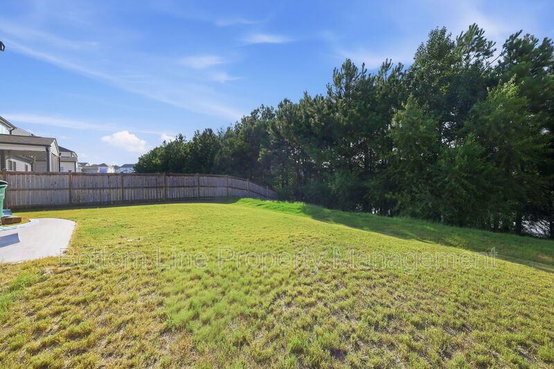 Solar-Powered Home! 4BR/3BA Home with Main-Level Guest Suite & Tesla Charging Station! property image