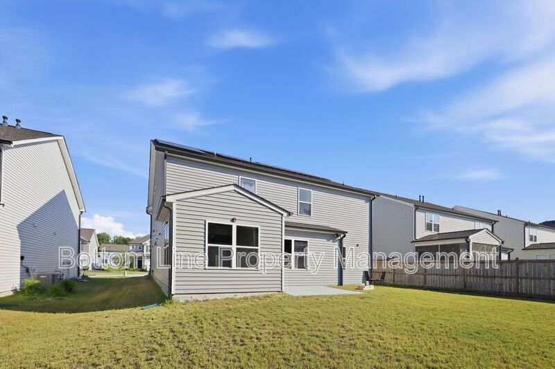 Solar-Powered Home! 4BR/3BA Home with Main-Level Guest Suite & Tesla Charging Station! property image