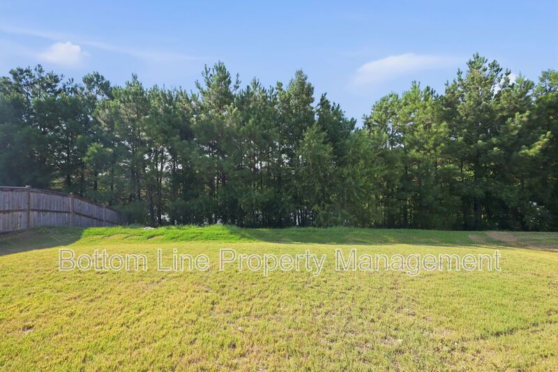 Solar-Powered Home! 4BR/3BA Home with Main-Level Guest Suite & Tesla Charging Station! property image