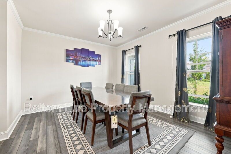 Solar-Powered Home! 4BR/3BA Home with Main-Level Guest Suite & Tesla Charging Station! property image
