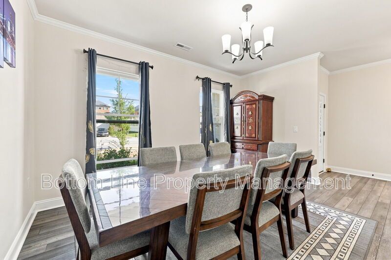 Solar-Powered Home! 4BR/3BA Home with Main-Level Guest Suite & Tesla Charging Station! property image
