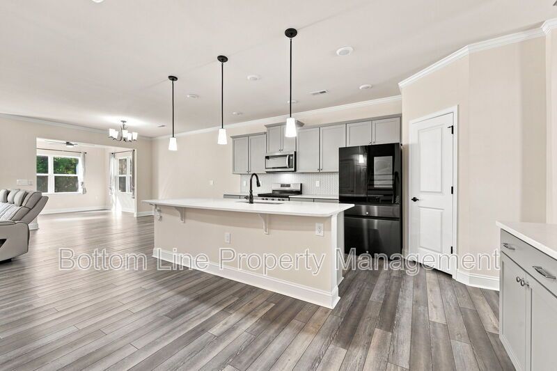 Solar-Powered Home! 4BR/3BA Home with Main-Level Guest Suite & Tesla Charging Station! property image