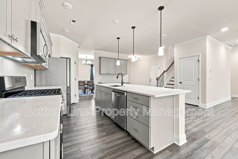 Solar-Powered Home! 4BR/3BA Home with Main-Level Guest Suite & Tesla Charging Station! property image