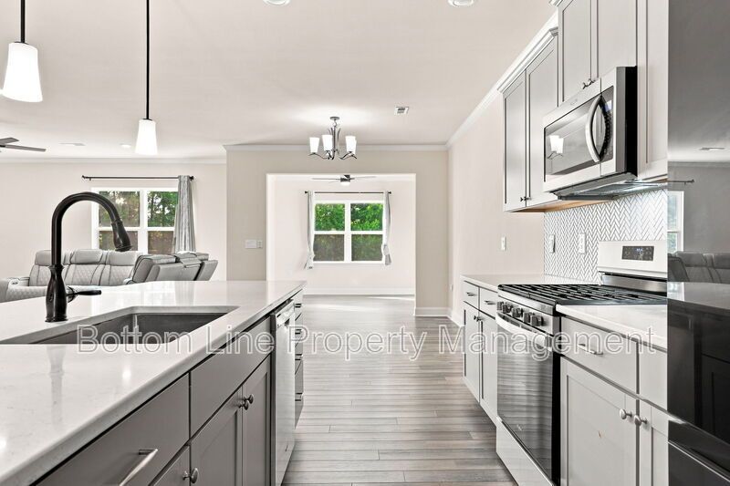 Solar-Powered Home! 4BR/3BA Home with Main-Level Guest Suite & Tesla Charging Station! property image