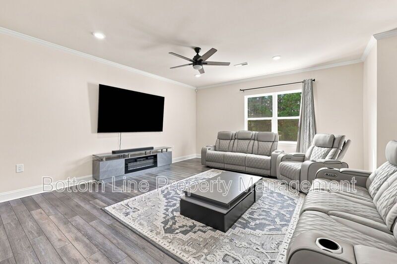 Solar-Powered Home! 4BR/3BA Home with Main-Level Guest Suite & Tesla Charging Station! property image