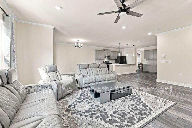 Solar-Powered Home! 4BR/3BA Home with Main-Level Guest Suite & Tesla Charging Station! property image