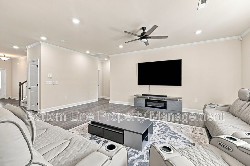 Solar-Powered Home! 4BR/3BA Home with Main-Level Guest Suite & Tesla Charging Station! property image