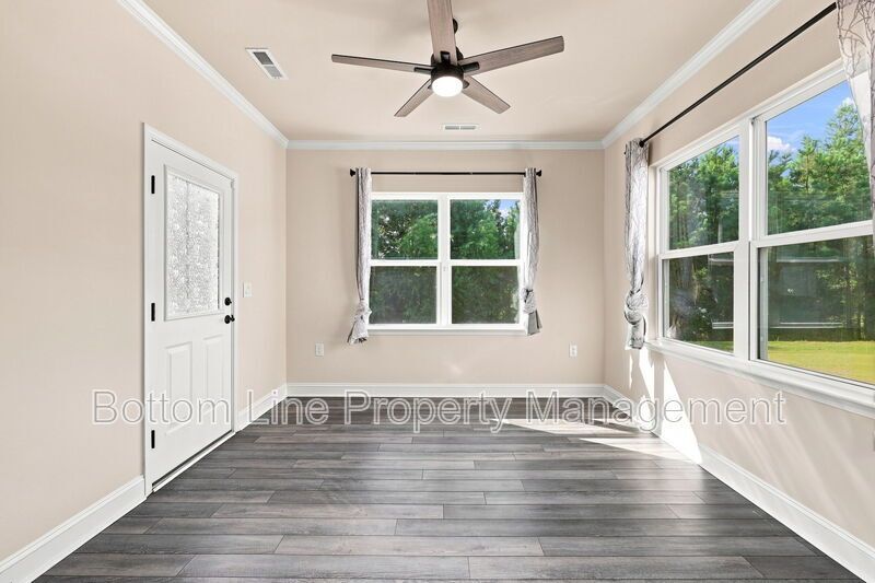 Solar-Powered Home! 4BR/3BA Home with Main-Level Guest Suite & Tesla Charging Station! property image
