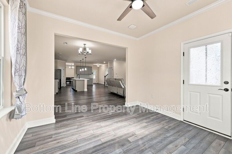 Solar-Powered Home! 4BR/3BA Home with Main-Level Guest Suite & Tesla Charging Station! property image