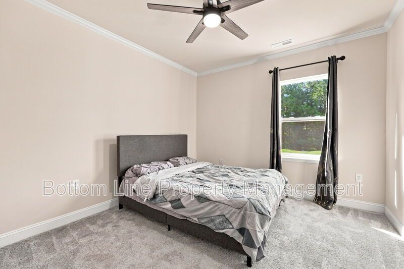 Solar-Powered Home! 4BR/3BA Home with Main-Level Guest Suite & Tesla Charging Station! property image