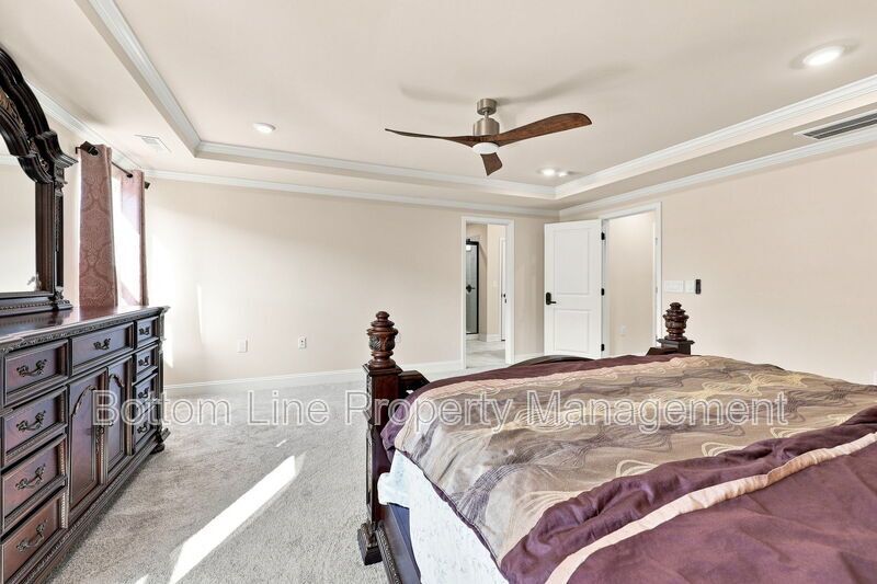Solar-Powered Home! 4BR/3BA Home with Main-Level Guest Suite & Tesla Charging Station! property image