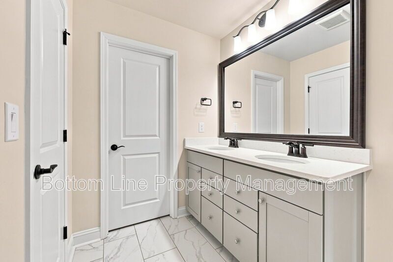 Solar-Powered Home! 4BR/3BA Home with Main-Level Guest Suite & Tesla Charging Station! property image