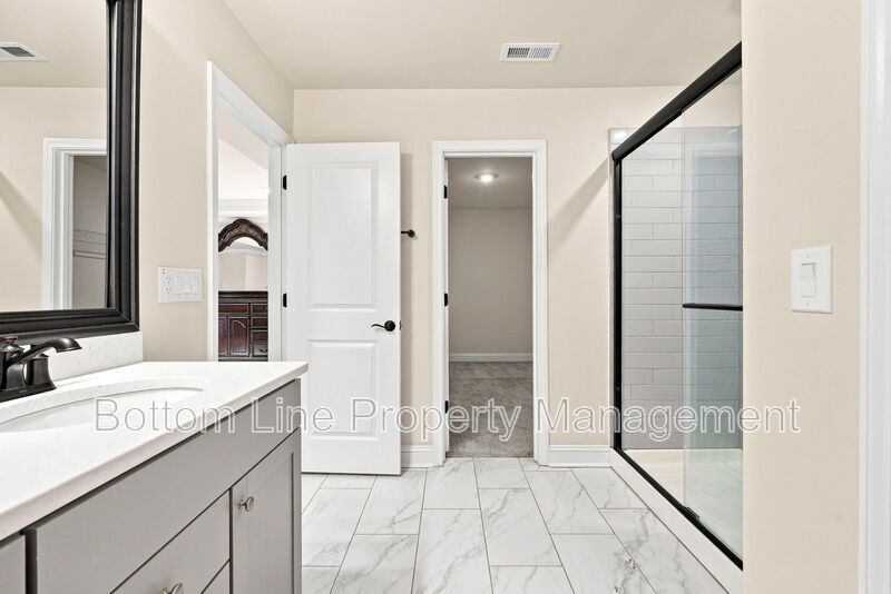 Solar-Powered Home! 4BR/3BA Home with Main-Level Guest Suite & Tesla Charging Station! property image