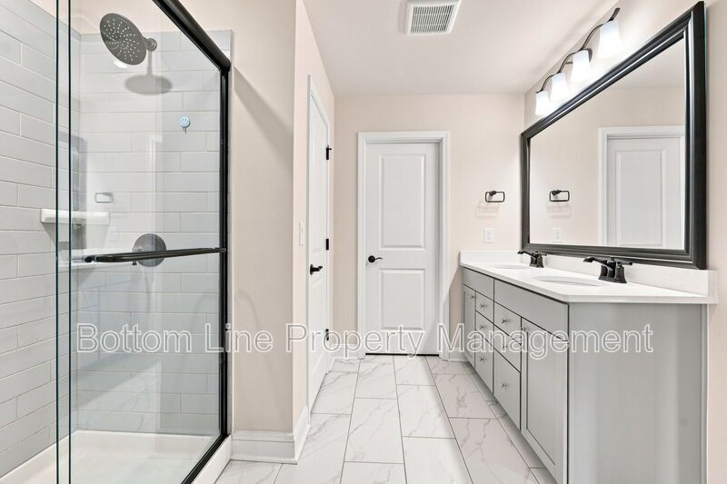 Solar-Powered Home! 4BR/3BA Home with Main-Level Guest Suite & Tesla Charging Station! property image