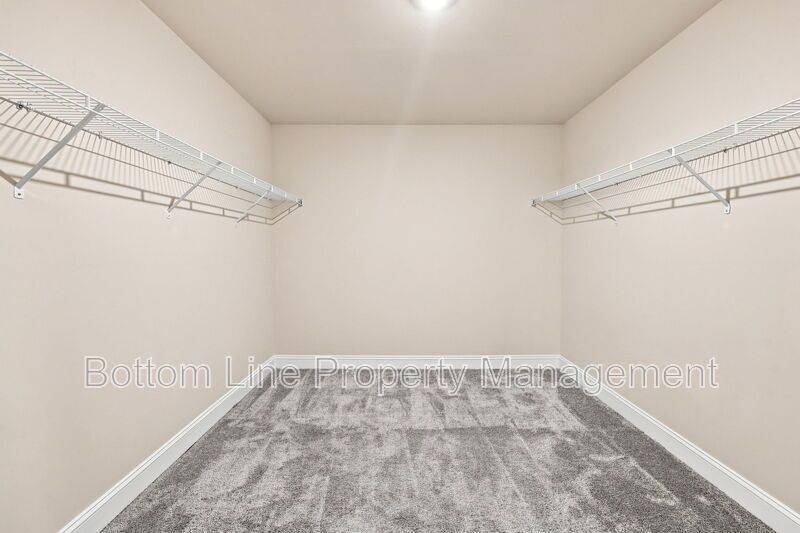 Solar-Powered Home! 4BR/3BA Home with Main-Level Guest Suite & Tesla Charging Station! property image