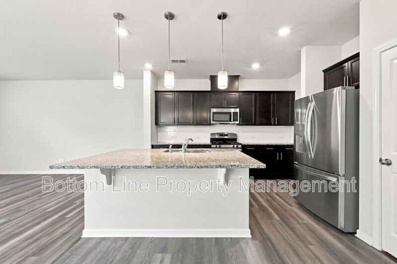 Spacious 3-Bedroom Raleigh Townhome with Screened Porch & 1-Car Garage property image
